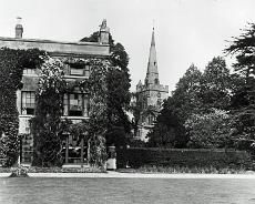 JoyW_0013 Lapworth Vicarage (now demolished) with Lapworth Church in the background