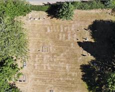 DJI_0286 Northern, 1887, section of Haseley graveyard showing hints of a large number of now unmarked graves revealed by the 2022 drought