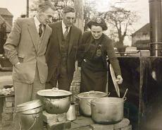 P1040009 Civil Defence Emergency Feeding Exercise at Rowington Village Hall in 1958. L-R: Cllr Vic Crowther, Mr LF Carter, Joan Stephens